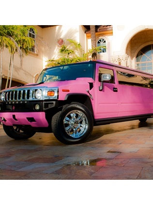 Pink Limousine To Pick Up Birthday Child And Friends